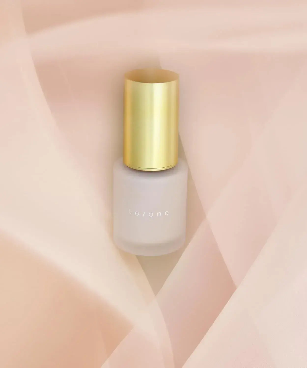 To One Base Luminescence Essence SPF22 Gloss Essence